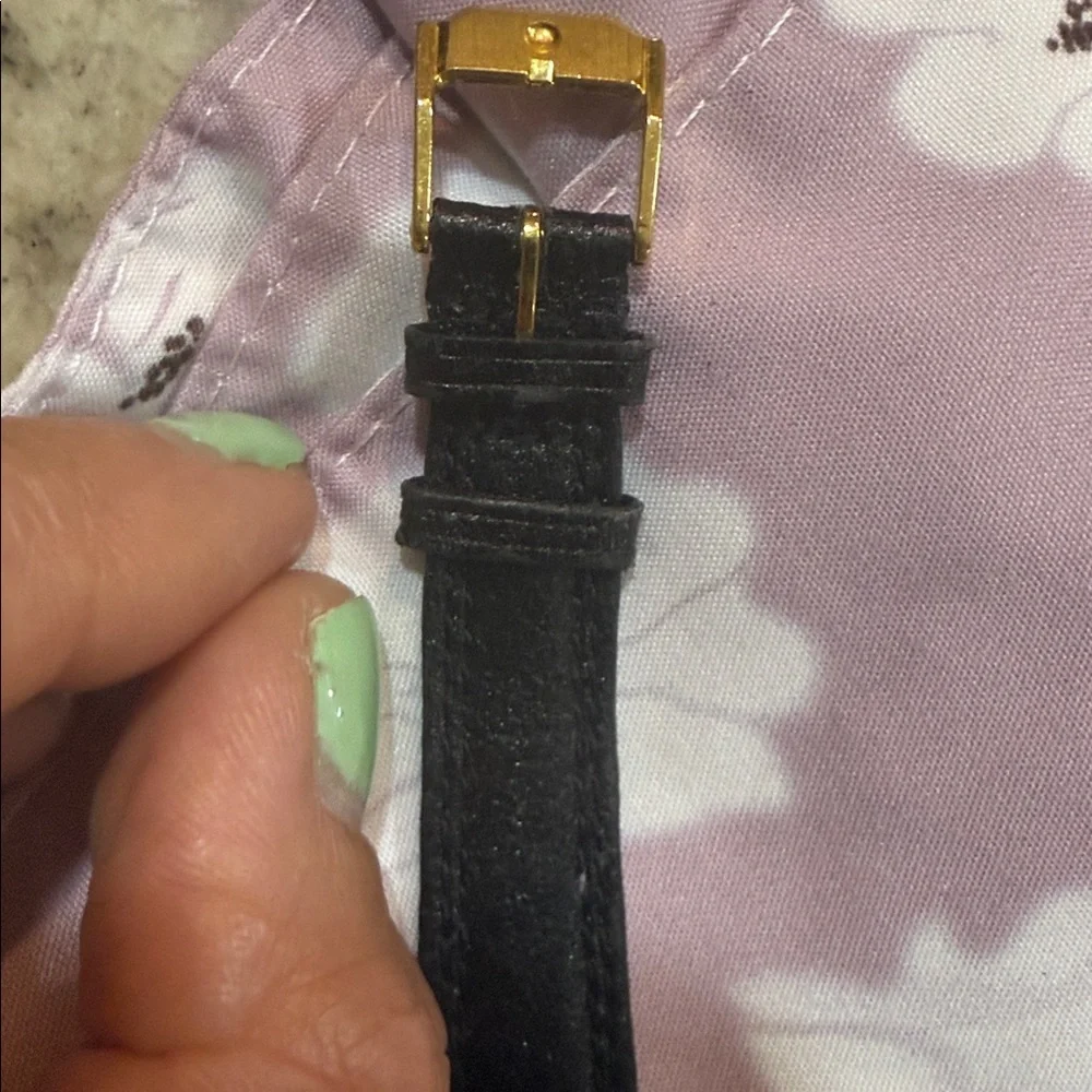 Authentic Women’s Vintage Movado Museum watch Gold face quartz crystal movement